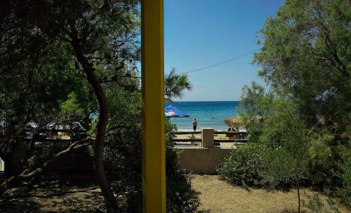 a view of a beach with the ocean in the background at VILA INSPIRATION - ON KINI BEACH in Kinion