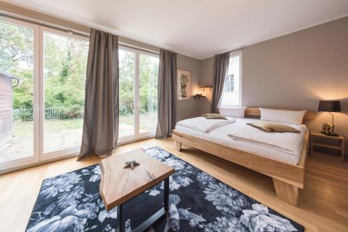 Postelja oz. postelje v sobi nastanitve Design Apartments - "Das Kutscherhaus"