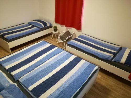 Postel nebo postele na pokoji v ubytování Apartmány LIPNOczech