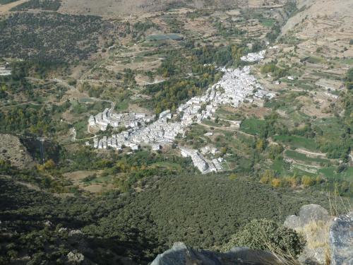 an aerial view of a town on a mountain at Hostal Casa Fermina- A 2 horas de las pistas de esquí in Trevélez