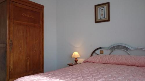 Кровать или кровати в номере Casa Estacio