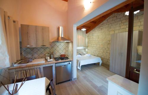 Η κουζίνα ή μικρή κουζίνα στο Donna Tommasa