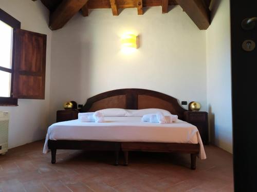 Postel nebo postele na pokoji v ubytování Hotel Punta Moros