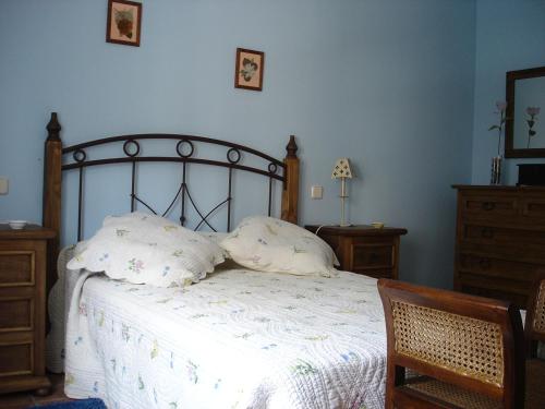 Postel nebo postele na pokoji v ubytování CASA RURAL CASA CANDI