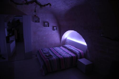 מיטה או מיטות בחדר ב-C'era Una Volta...