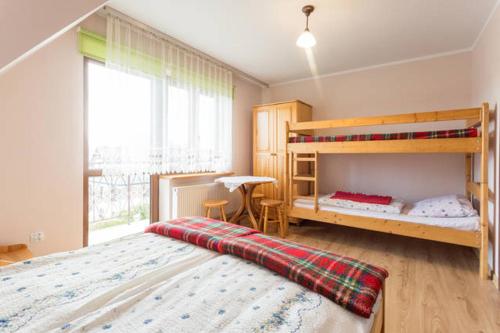 Postel nebo postele na pokoji v ubytování Noclegi u Weroniki