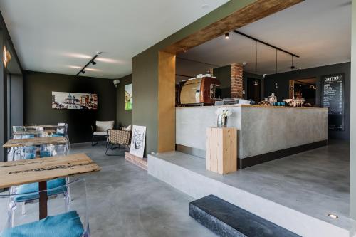 Кухня или мини-кухня в VILLA BRICOLA - Boutique Apartments
