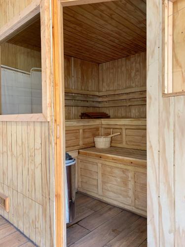 an inside view of a sauna in a cabin at Leonera Hotel in La Leonera