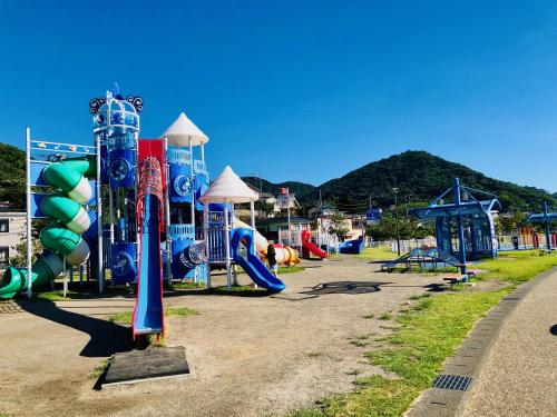 a playground with a bunch of slides and slidesktop at Izu Kansya in Atami