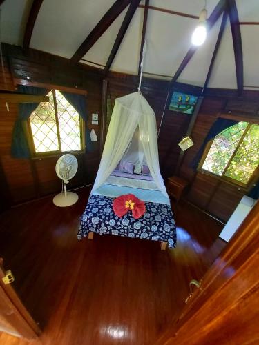 Postel nebo postele na pokoji v ubytování Bungalows Aché Cahuita