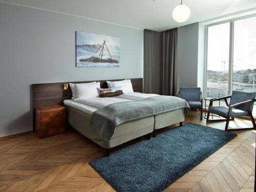 Ένα ή περισσότερα κρεβάτια σε δωμάτιο στο Mandal Hotel