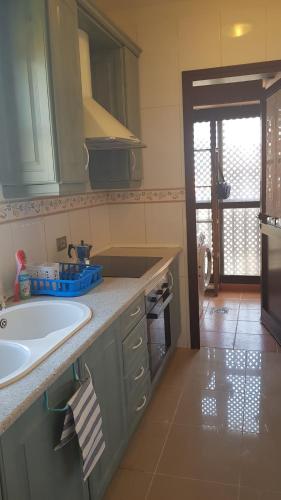 a kitchen with a sink and a counter top at Sea Mountain in Atlántico in Costa Del Silencio