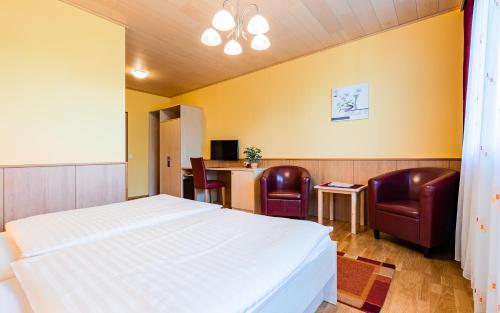 Cama o camas de una habitación en Hotel garni Steinfeld