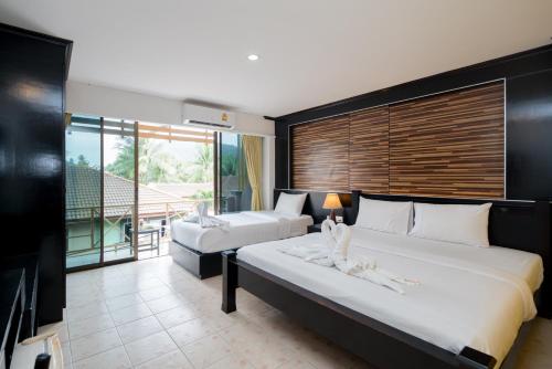 Cama o camas de una habitación en Royal Beach Residence