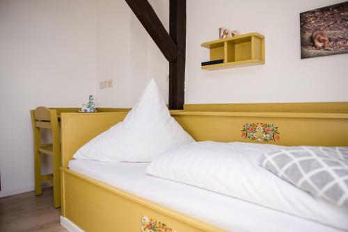 Ein Bett oder Betten in einem Zimmer der Unterkunft Allmanns-Kroog