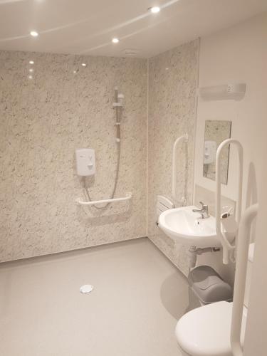 A bathroom at Wensum Lodge Hotel 