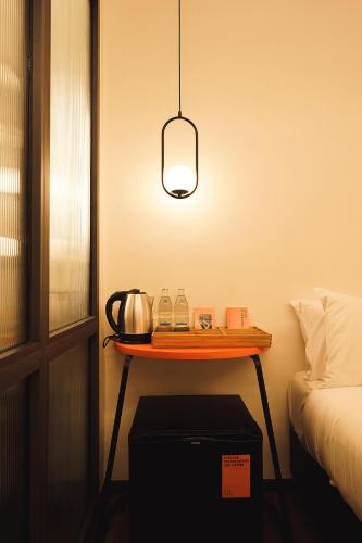 Ένα ή περισσότερα κρεβάτια σε δωμάτιο στο Wonderwall Hotel