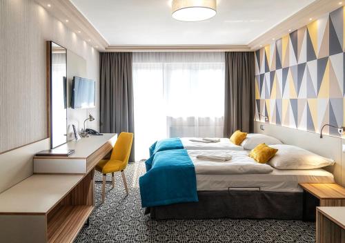 Katil atau katil-katil dalam bilik di Hotel Stok