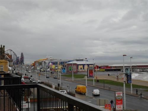 a busy city street with cars on the road at Anzy Panzy Hotel and Apartments in Blackpool