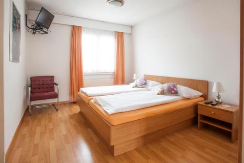 Postel nebo postele na pokoji v ubytování Hotel Zur Au