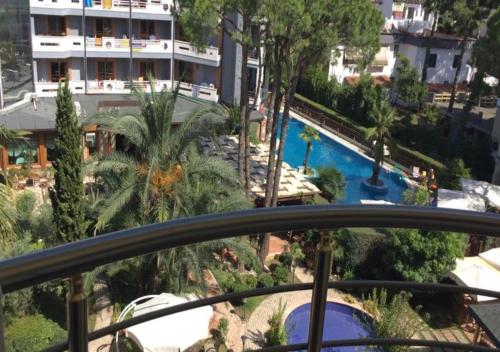 a view of a swimming pool from a balcony at Lovely Apartment in Golem