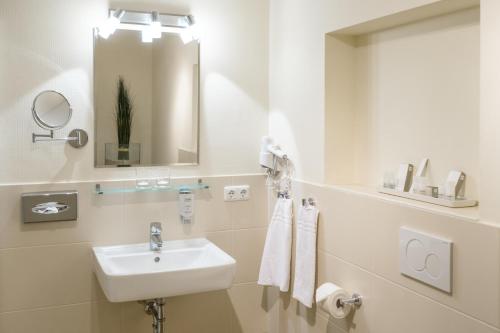Bilik mandi di Das Frühstückshotel Sankt Peter-Ording