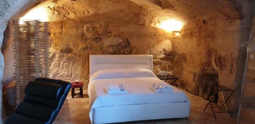 Postel nebo postele na pokoji v ubytování Italian Soul Suite - living experience