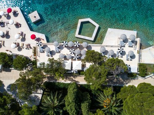 an aerial view of a resort near the ocean at Hotel Bellevue in Mali Lošinj