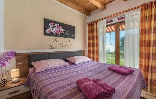Postel nebo postele na pokoji v ubytování Holiday House Antonio