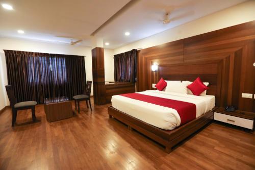 Postel nebo postele na pokoji v ubytování Traders Hotel - Kankanady, Mangalore