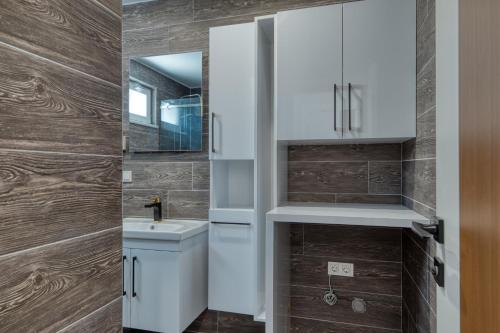 a bathroom with a toilet and a sink at Grisverde Suites in Istanbul