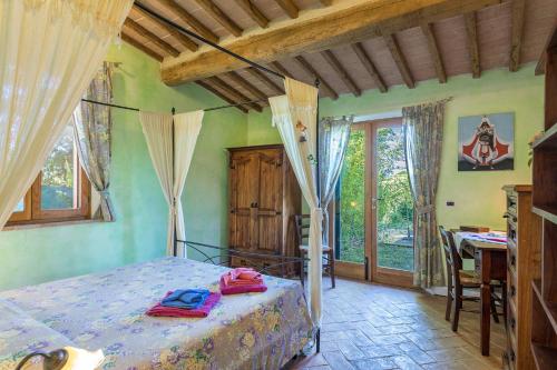 Un pat sau paturi într-o cameră la Villa Edera
