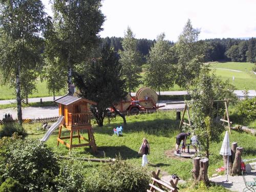a group of children playing in a playground at Alpenblick Weibhausen in Weibhausen
