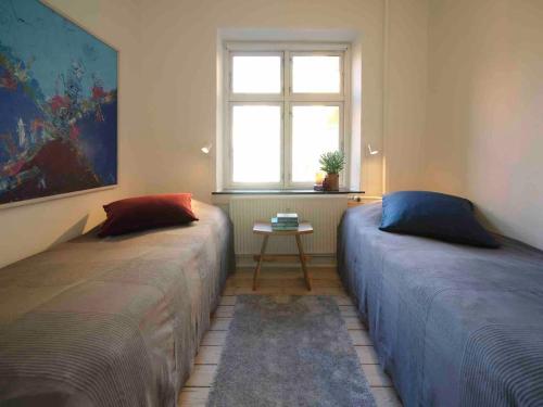 Postel nebo postele na pokoji v ubytování Cozy Stay