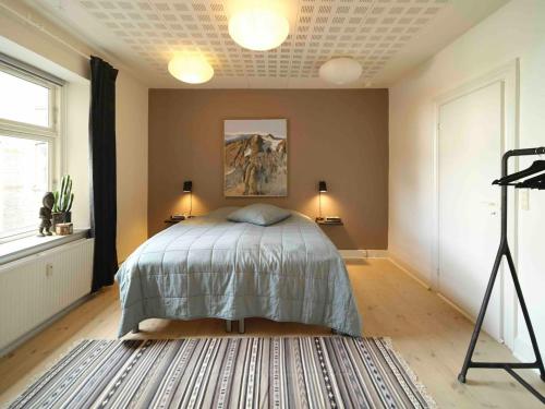 Postel nebo postele na pokoji v ubytování Cozy Stay