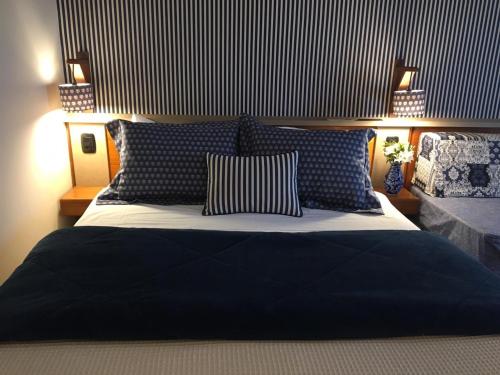 Postel nebo postele na pokoji v ubytování Serra Alta Hotel