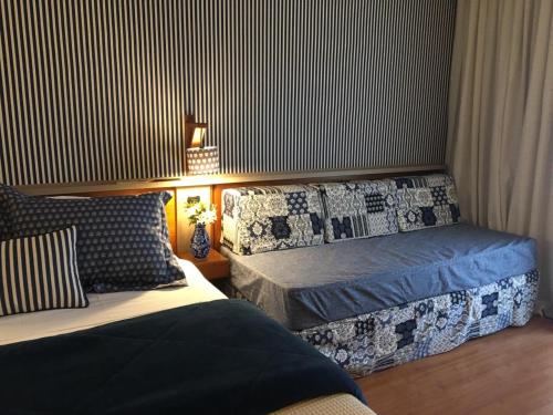 Postel nebo postele na pokoji v ubytování Serra Alta Hotel