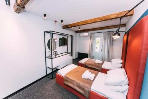Postel nebo postele na pokoji v ubytování Atoneli Apartment hotel