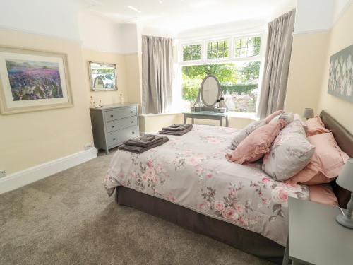 Ένα ή περισσότερα κρεβάτια σε δωμάτιο στο Park View