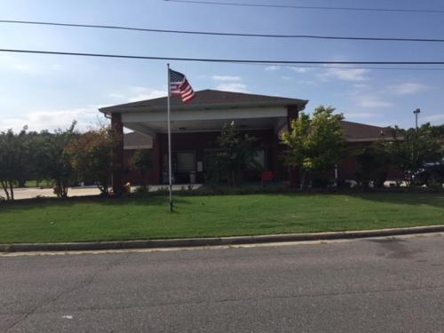 a house with an american flag in front of it at Exclusive Quarters in Cleveland