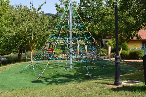 a merry go round in a park at Legaire Etxea in Ibarguren