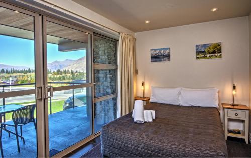 Voodi või voodid majutusasutuse Autoline Motel Queenstown toas