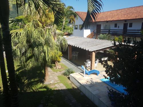 Uma vista da piscina em Vargas Peruibe Hotel ou nos arredores