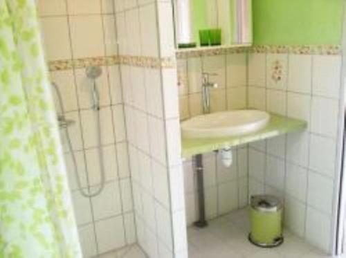 Ванна кімната в Ecuries Leseigneur - Gite