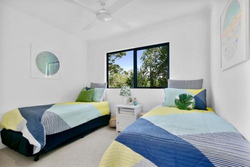 Cama o camas de una habitación en Sunny and spacious Sunshine Beach