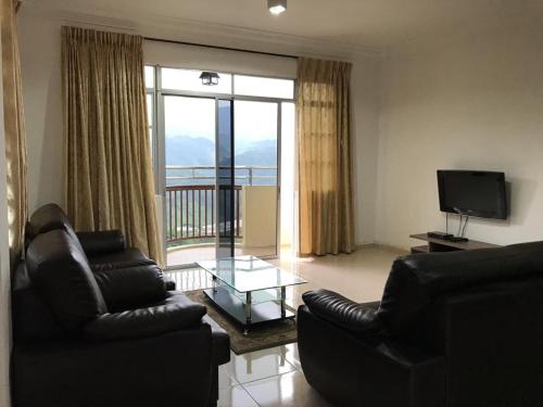 Μια τηλεόραση ή/και κέντρο ψυχαγωγίας στο 3 Rooms Apt @ Crown Imperial Court