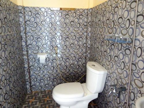 Vonios kambarys apgyvendinimo įstaigoje Golo Tango Homestay