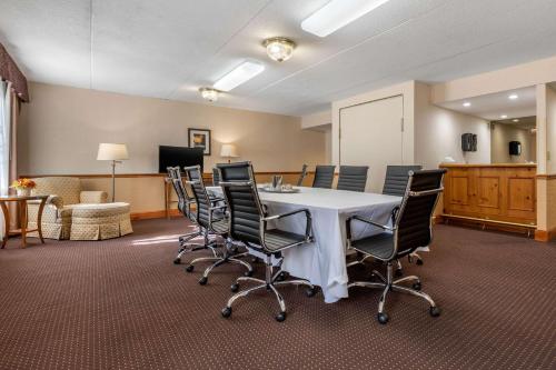 a conference room with a table and chairs at Clarion Hotel Conference Center on Lake Erie in Dunkirk