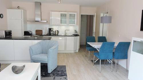 Kuchyň nebo kuchyňský kout v ubytování Ferienwohnung Timmendorfer