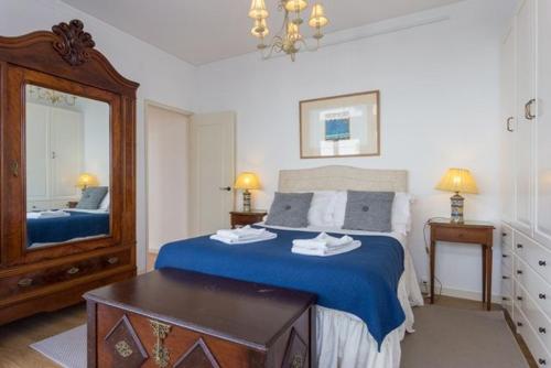 Katil atau katil-katil dalam bilik di Carcavelos - Holiday Beach Apartment